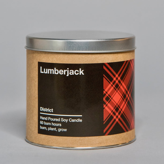Hand poured soy candle in a metal tin with rustic label and red plaid design for home decor and gifts