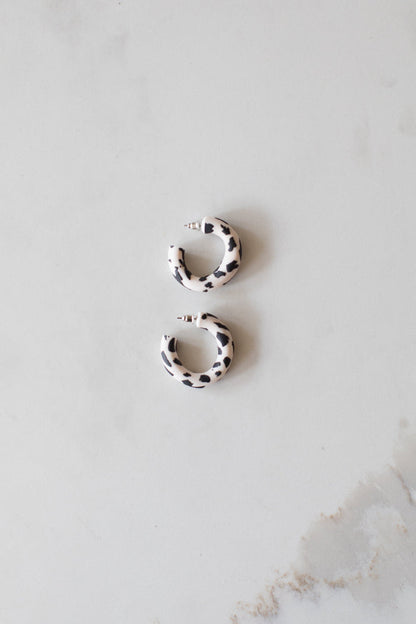 Dr Christine Earrings Black Cow Print