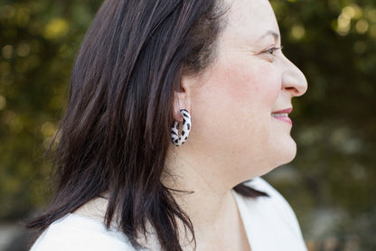 Dr Christine Earrings Black Cow Print