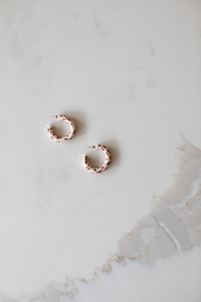 Dr Christine Earrings Black Cow Print