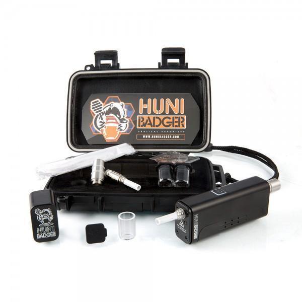 Huni Badger Vertical Vaporizer Kit, compact rechargeable device with accessories for versatile and portable concentrate dabbing.