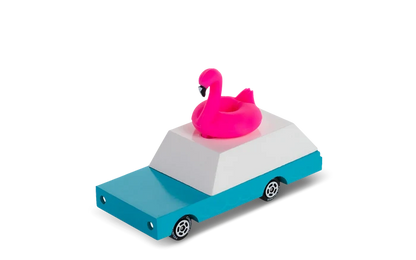 Toy wagon with bright pink flamingo figure and a blue and white rectangular base designed like a car.