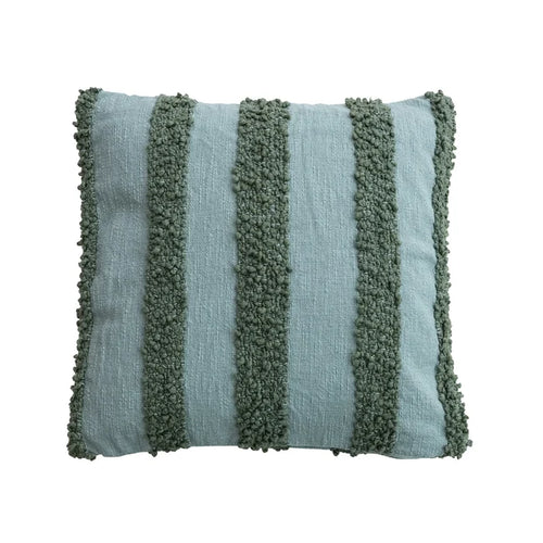 blue pillow with textured green stripes on a white background